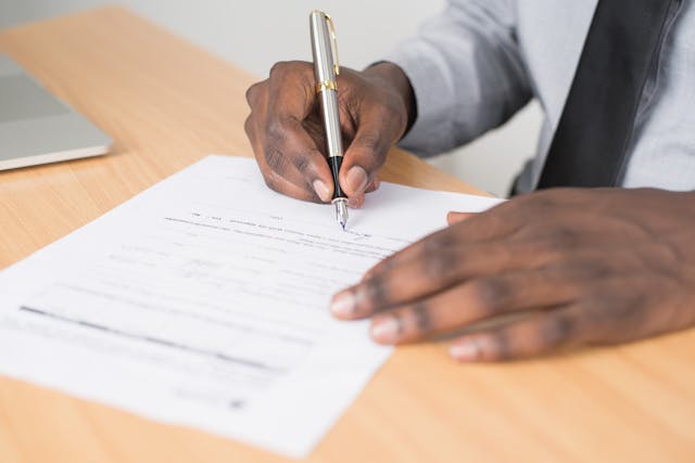 Person signing a lease agreement
